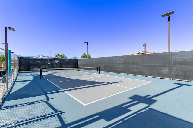 6909 Toll Mountain St, North Las Vegas, NV 89086 - view of tennis court featuring community basketball court