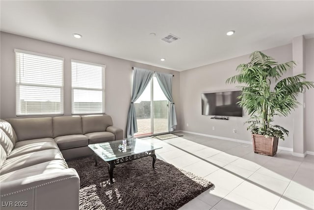6909 Toll Mountain St, North Las Vegas, NV 89086 - living area featuring light tile patterned flooring and recessed lighting