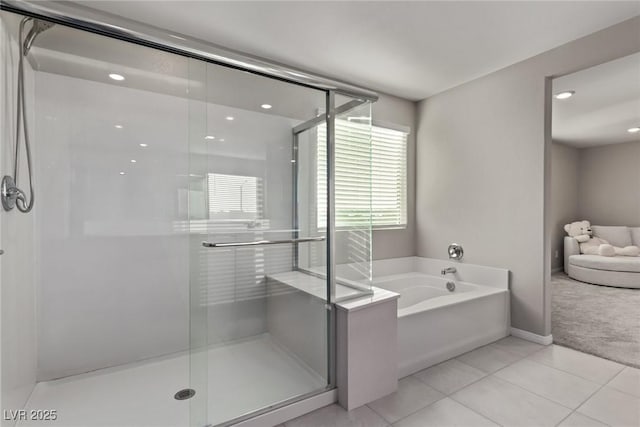 6909 Toll Mountain St, North Las Vegas, NV 89086 - full bathroom with a garden tub, a stall shower, tile patterned flooring, and recessed lighting