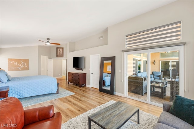 286 Bowsprit Ct, Las Vegas, NV 89183 - bedroom featuring light wood-style floors, access to outside, ceiling fan, and a towering ceiling