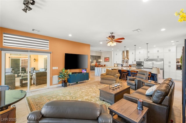 286 Bowsprit Ct, Las Vegas, NV 89183 - living room featuring light tile patterned flooring, a ceiling fan, and recessed lighting