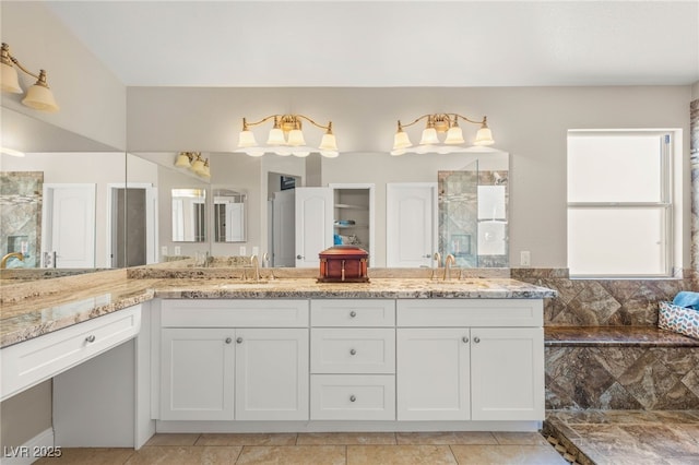 286 Bowsprit Ct, Las Vegas, NV 89183 - bathroom featuring double vanity, a walk in shower, and tile patterned floors