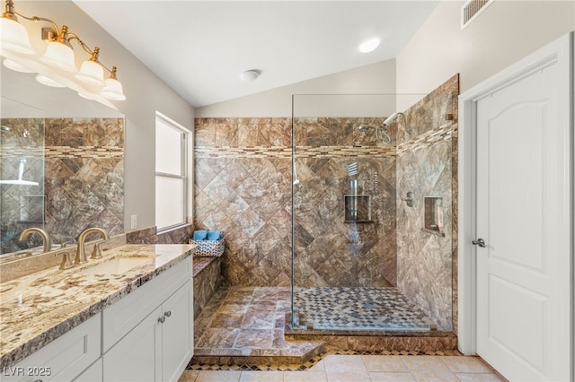 286 Bowsprit Ct, Las Vegas, NV 89183 - full bath featuring vaulted ceiling, vanity, and a marble finish shower