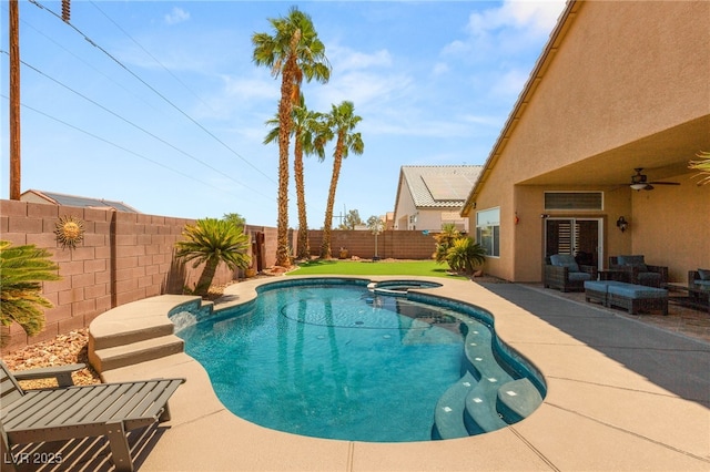 286 Bowsprit Ct, Las Vegas, NV 89183 - view of pool featuring a fenced backyard, a ceiling fan, a patio, a pool with connected hot tub, and an outdoor living space