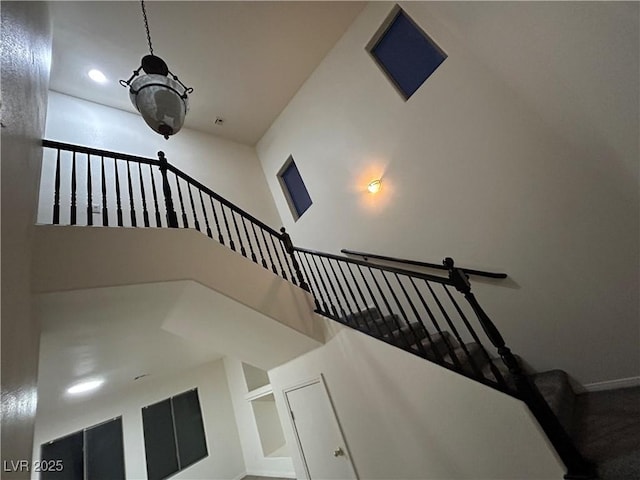 6412 Point Break St, North Las Vegas, NV 89084 - stairway featuring recessed lighting