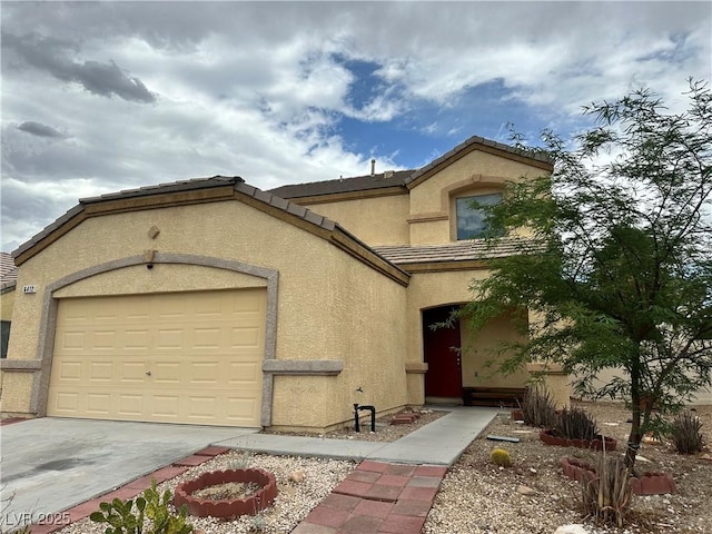 6412 Point Break St, North Las Vegas, NV 89084 - mediterranean / spanish home featuring stucco siding, a garage, a tile roof, and driveway