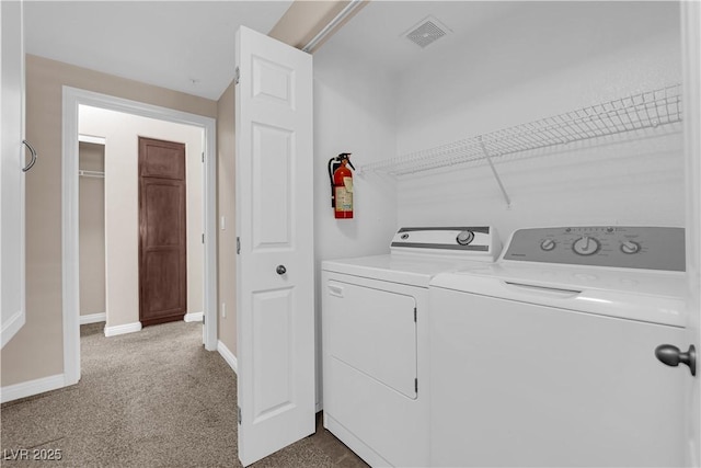 2291 W Horizon Ridge Parkway Unit 6131, Henderson, NV 89052 - washroom with separate washer and dryer and dark carpet