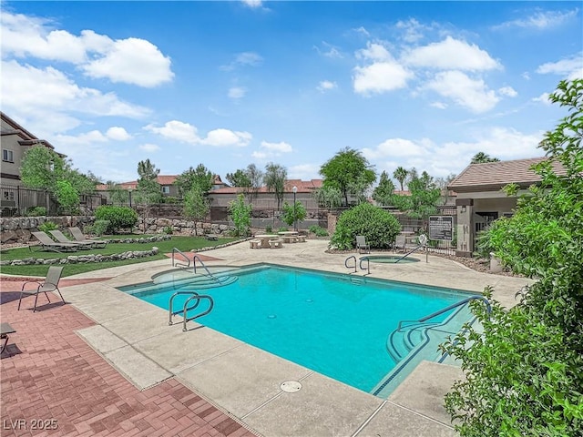 2291 W Horizon Ridge Parkway Unit 6131, Henderson, NV 89052 - community pool with a patio area and a community hot tub