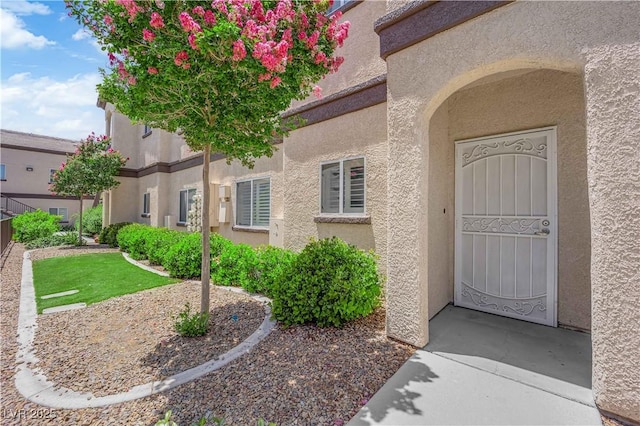 2291 W Horizon Ridge Parkway Unit 6131, Henderson, NV 89052 - view of exterior entry featuring stucco siding