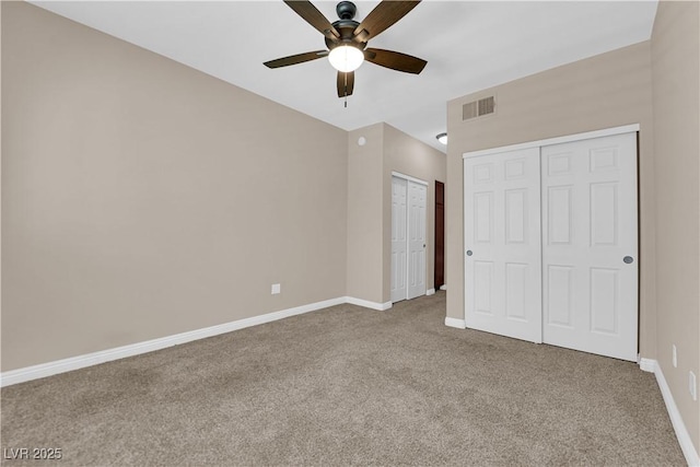 2291 W Horizon Ridge Parkway Unit 6131, Henderson, NV 89052 - unfurnished bedroom with carpet floors, two closets, and ceiling fan