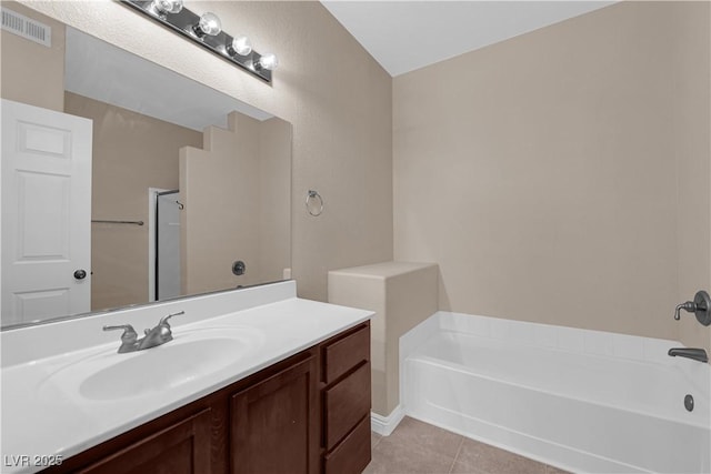 2291 W Horizon Ridge Parkway Unit 6131, Henderson, NV 89052 - full bath with a garden tub, tile patterned flooring, and vanity