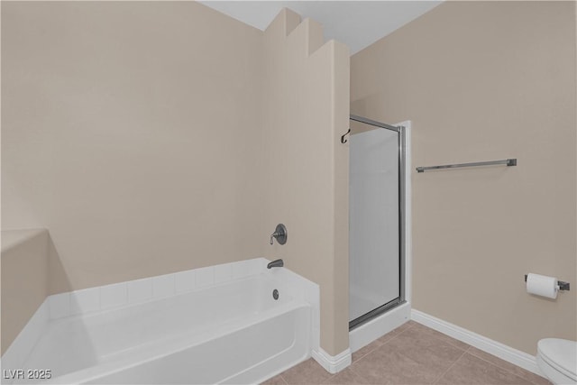 2291 W Horizon Ridge Parkway Unit 6131, Henderson, NV 89052 - bathroom featuring a bath, a shower stall, and tile patterned floors