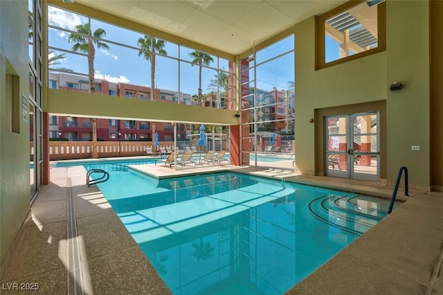 75 E Agate Ave Unit 206, Las Vegas, NV 89123 - indoor community pool featuring a patio and french doors