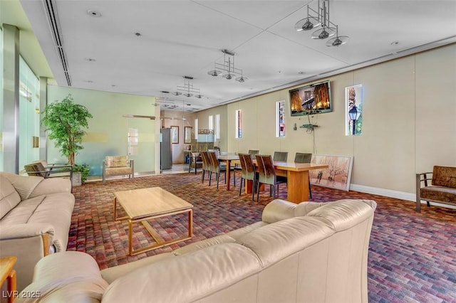 75 E Agate Ave Unit 206, Las Vegas, NV 89123 - living area featuring brick patterned floors and baseboards
