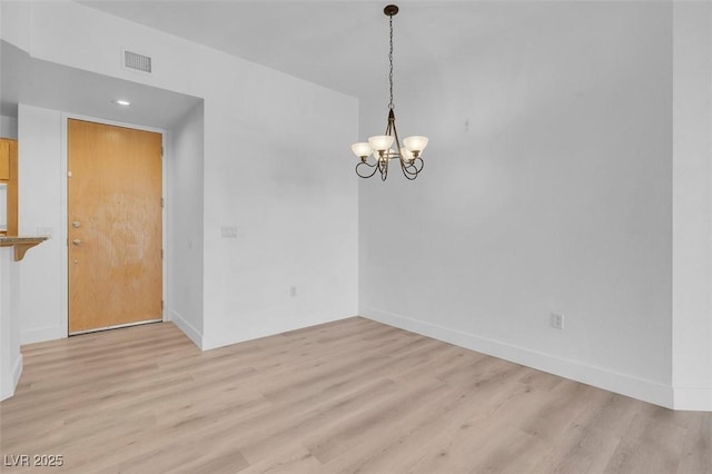 75 E Agate Ave Unit 206, Las Vegas, NV 89123 - unfurnished room featuring light wood-type flooring, a chandelier, and recessed lighting