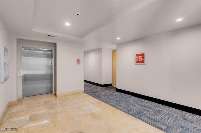 75 E Agate Ave Unit 206, Las Vegas, NV 89123 - carpeted spare room with elevator, recessed lighting, a smoke detector, and a raised ceiling