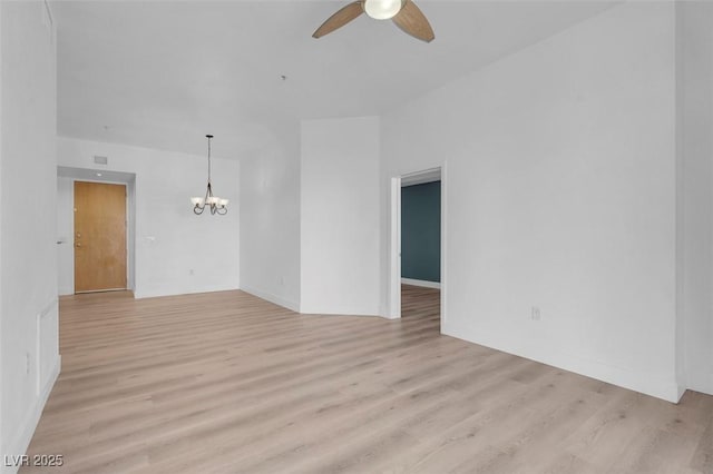 75 E Agate Ave Unit 206, Las Vegas, NV 89123 - empty room featuring a ceiling fan, a chandelier, and light wood-type flooring