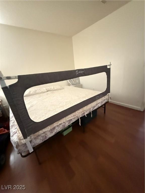 3150 Soft Breezes Dr Unit 1167, Las Vegas, NV 89128 - bedroom with wood finished floors and baseboards