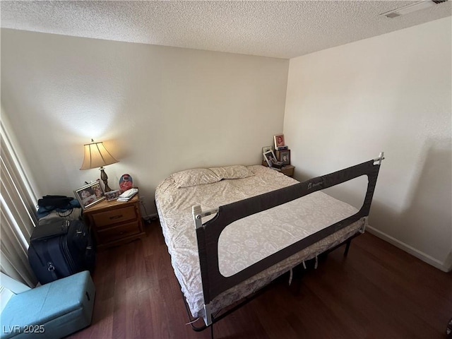 3150 Soft Breezes Dr Unit 1167, Las Vegas, NV 89128 - bedroom with wood finished floors and a textured ceiling