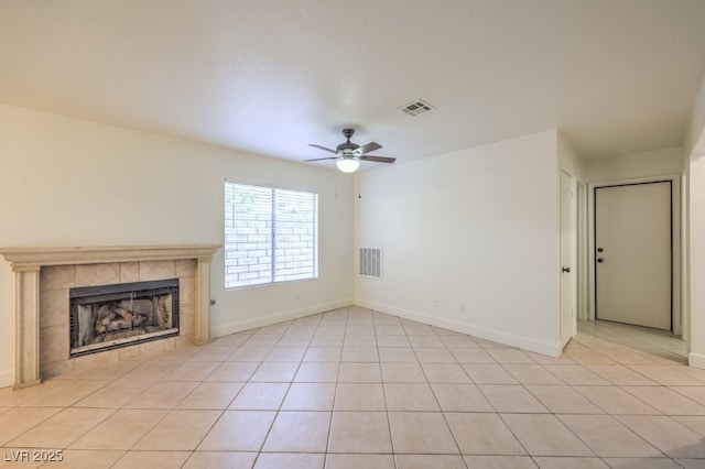 2501 Muirfield Ave, Henderson, NV 89074 - unfurnished living room with ceiling fan, a fireplace, and light tile patterned flooring