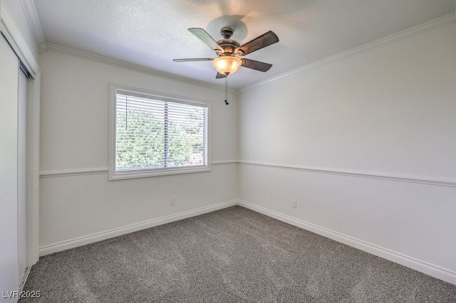 2501 Muirfield Ave, Henderson, NV 89074 - carpeted spare room featuring ceiling fan and crown molding