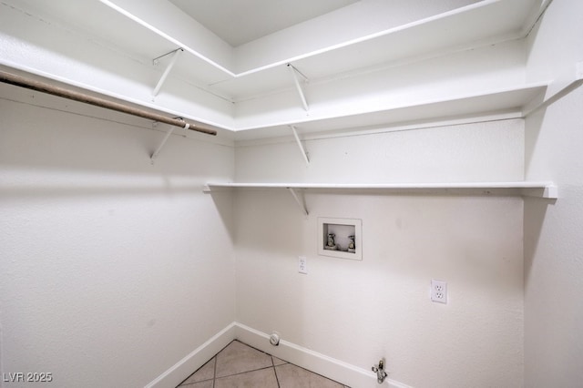 2501 Muirfield Ave, Henderson, NV 89074 - laundry area featuring gas dryer hookup, hookup for a washing machine, and light tile patterned flooring
