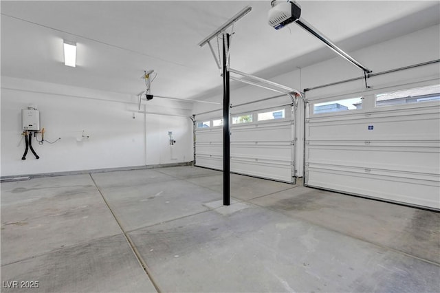 629 Soaring Wings Ave, Las Vegas, NV 89183 - garage with a garage door opener and water heater