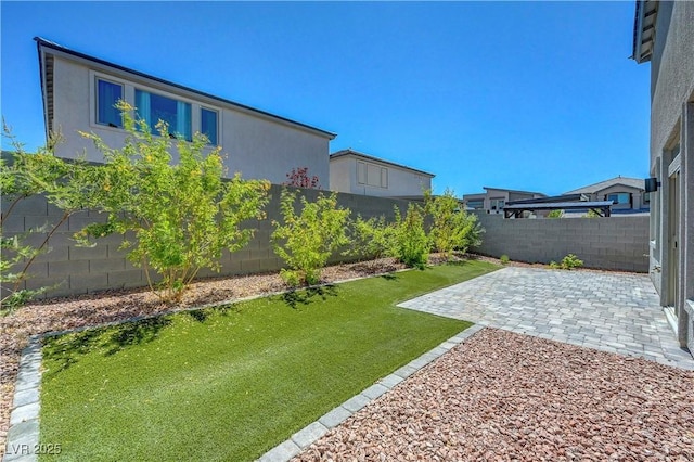 629 Soaring Wings Ave, Las Vegas, NV 89183 - fenced backyard featuring a patio area