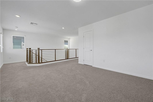 629 Soaring Wings Ave, Las Vegas, NV 89183 - unfurnished room featuring carpet, plenty of natural light, and recessed lighting