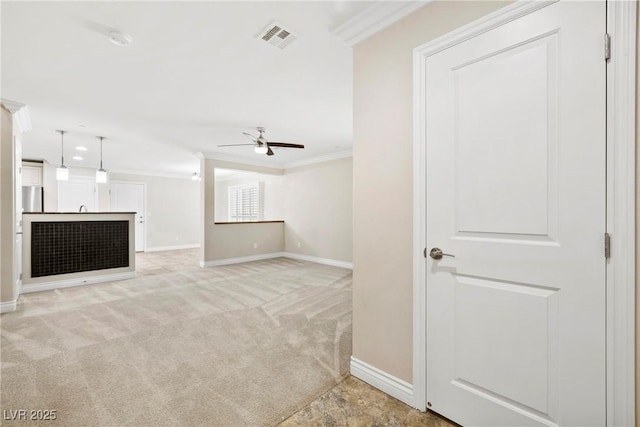 2385 Via Firenze, Henderson, NV 89044 - unfurnished living room with ornamental molding, a ceiling fan, and light carpet