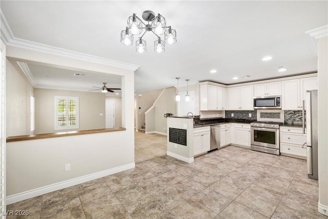 2385 Via Firenze, Henderson, NV 89044 - kitchen featuring stainless steel appliances, backsplash, dark countertops, crown molding, and open floor plan