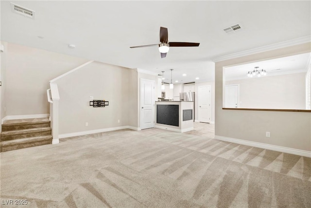 2385 Via Firenze, Henderson, NV 89044 - unfurnished living room with light carpet, a ceiling fan, crown molding, stairway, and recessed lighting