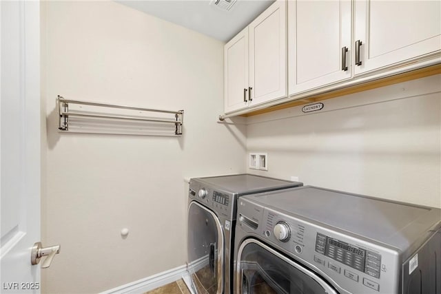 2385 Via Firenze, Henderson, NV 89044 - laundry room with cabinet space and independent washer and dryer