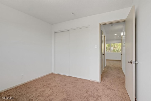 304 Orland St Unit 47, Las Vegas, NV 89107 - unfurnished bedroom featuring carpet floors and a closet