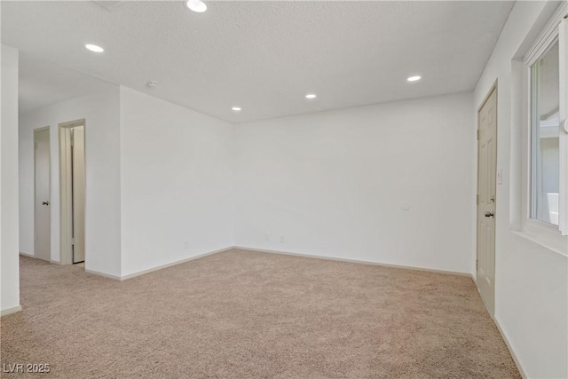 304 Orland St Unit 47, Las Vegas, NV 89107 - unfurnished room featuring carpet flooring and recessed lighting
