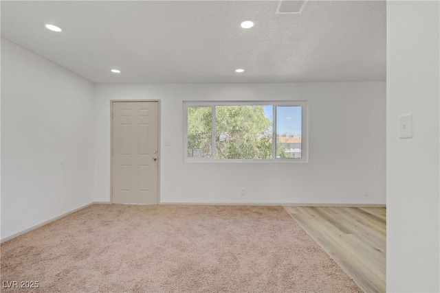304 Orland St Unit 47, Las Vegas, NV 89107 - carpeted spare room featuring recessed lighting
