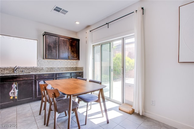 10434 Rose Palisade St, Las Vegas, NV 89141 - dining area featuring light tile patterned flooring and recessed lighting