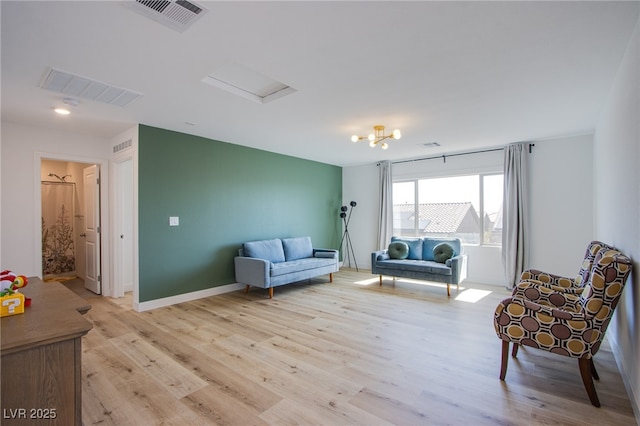 10434 Rose Palisade St, Las Vegas, NV 89141 - sitting room featuring light wood-type flooring and attic access