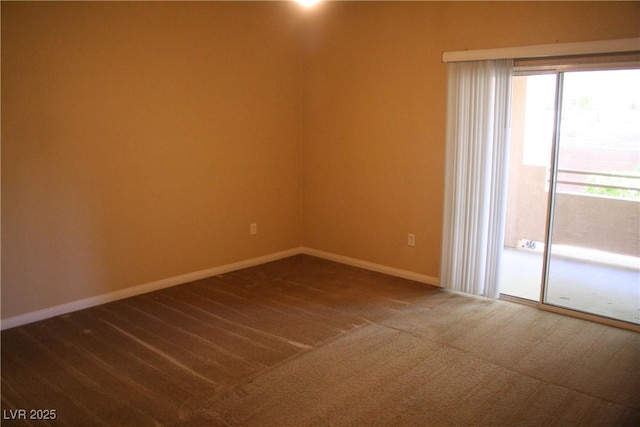 830 Carnegie St Unit 1011, Henderson, NV 89052 - unfurnished room with dark carpet and baseboards