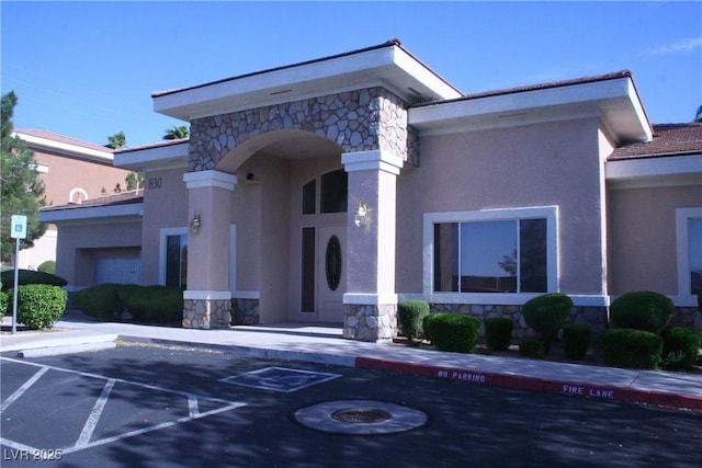 830 Carnegie St Unit 1011, Henderson, NV 89052 - view of building exterior with uncovered parking