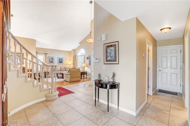 8416 Dry Cliff Cir, Las Vegas, NV 89128 - foyer with stairway and light tile patterned floors