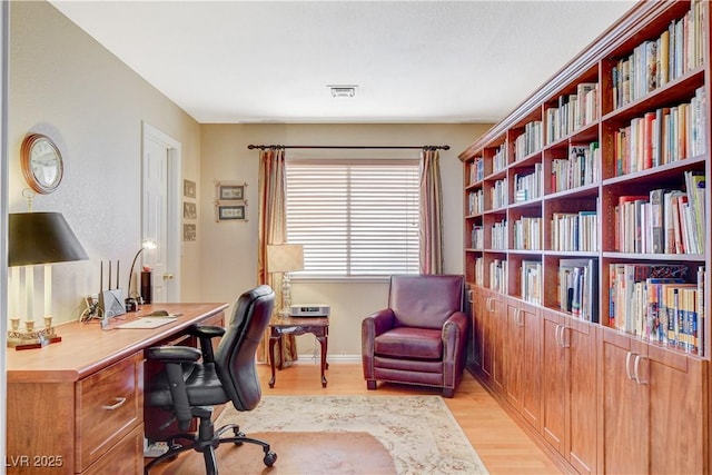 8416 Dry Cliff Cir, Las Vegas, NV 89128 - office area featuring light wood-type flooring and baseboards