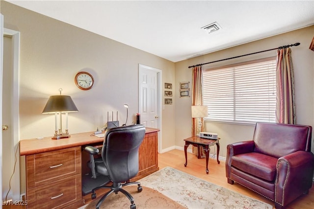 8416 Dry Cliff Cir, Las Vegas, NV 89128 - office area featuring light wood-style flooring and baseboards