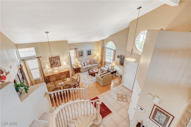 8416 Dry Cliff Cir, Las Vegas, NV 89128 - tiled living area featuring high vaulted ceiling