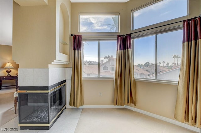 8416 Dry Cliff Cir, Las Vegas, NV 89128 - unfurnished living room featuring baseboards