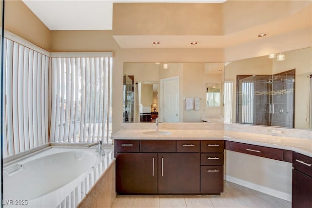 8416 Dry Cliff Cir, Las Vegas, NV 89128 - full bath featuring vanity, a bath, a stall shower, tile patterned floors, and connected bathroom