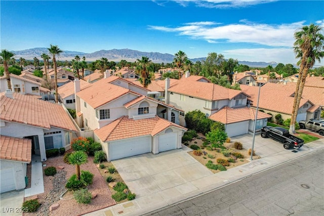 8416 Dry Cliff Cir, Las Vegas, NV 89128 - aerial view of residential area featuring a mountain backdrop
