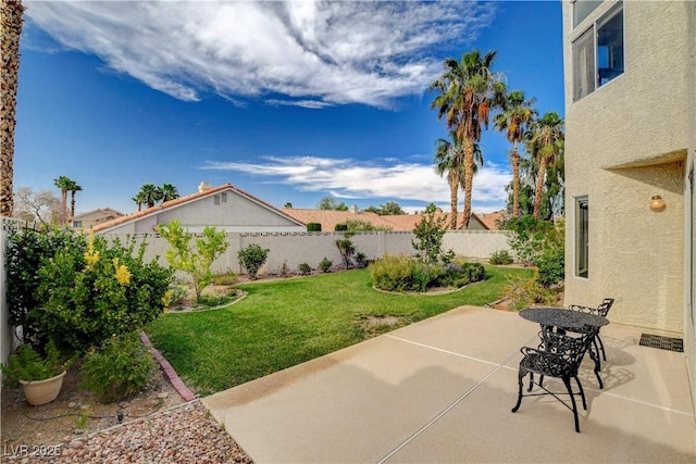 8416 Dry Cliff Cir, Las Vegas, NV 89128 - fenced backyard with a patio