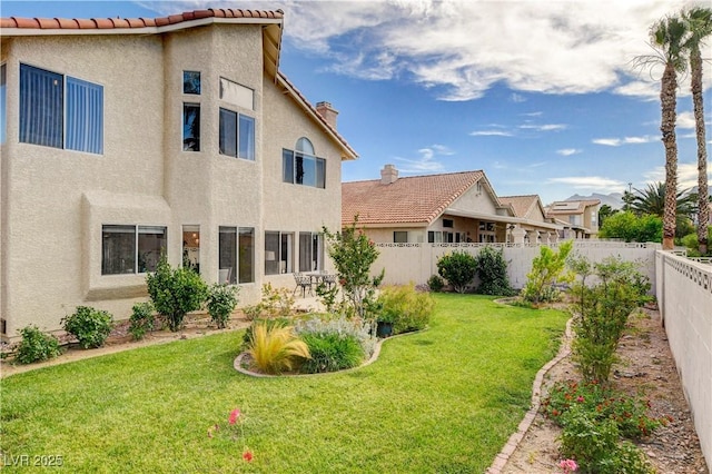 8416 Dry Cliff Cir, Las Vegas, NV 89128 - rear view of house featuring stucco siding, a fenced backyard, and a tile roof