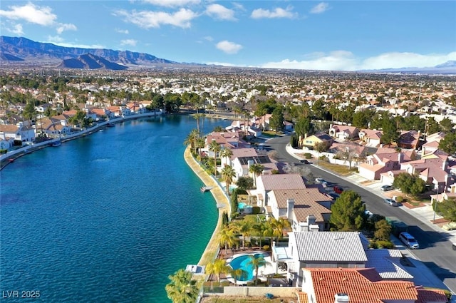 8416 Dry Cliff Cir, Las Vegas, NV 89128 - aerial view of residential area featuring a water and mountain view and a pool area
